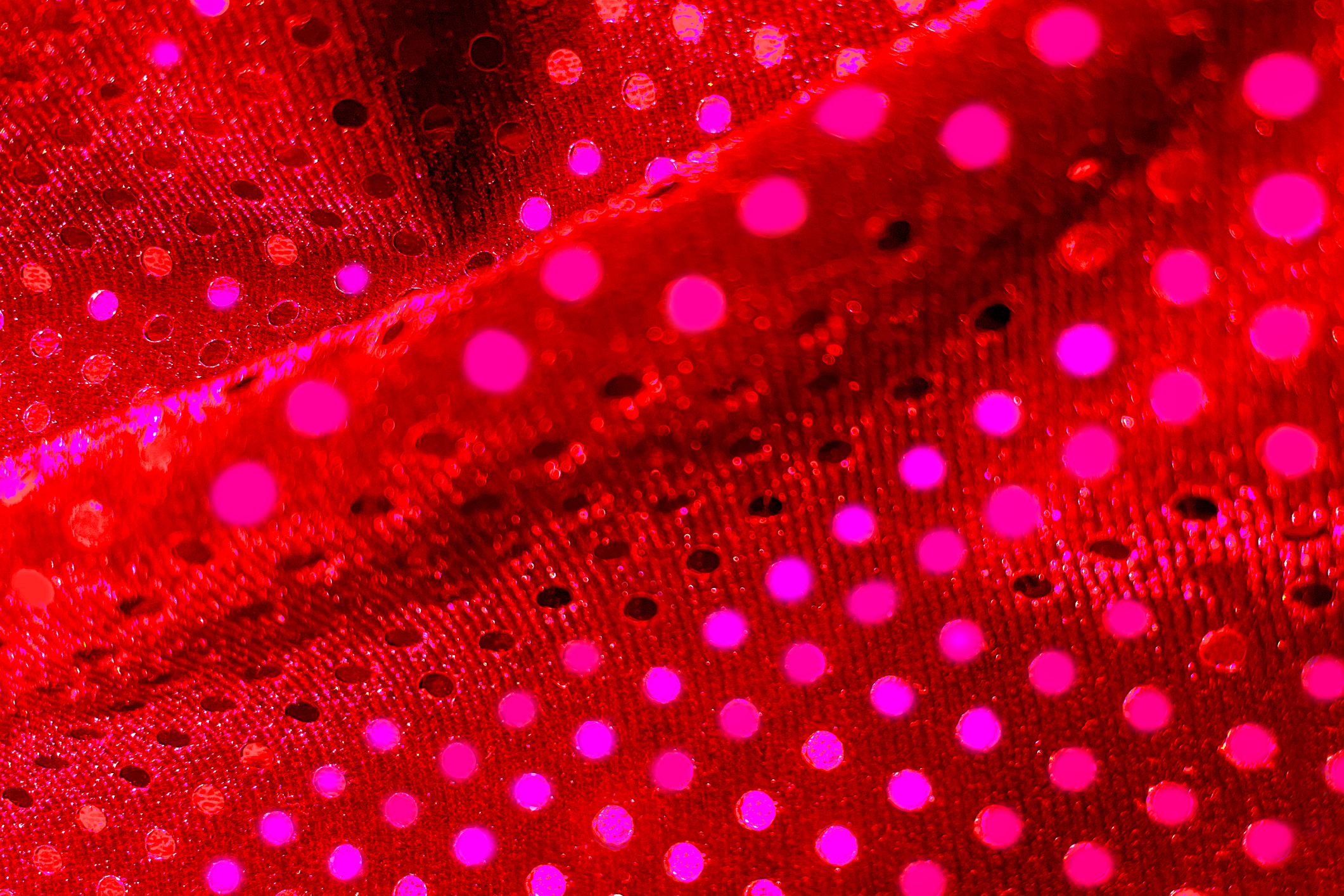 close-up of vibrantly glowing red fabric