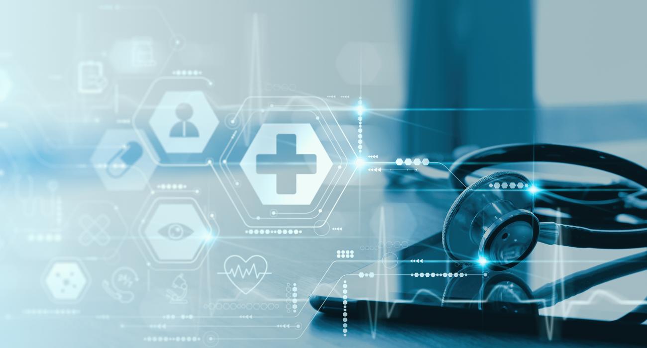 blue image with stethoscope laying over a tablet